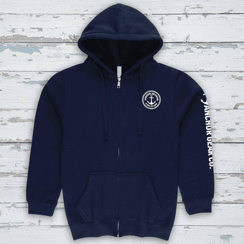 A navy blue full zip hoodie with a hood, featuring anchor symbols and text that reads 'Anchored by Passion, Fuelled by Waves' on the back.