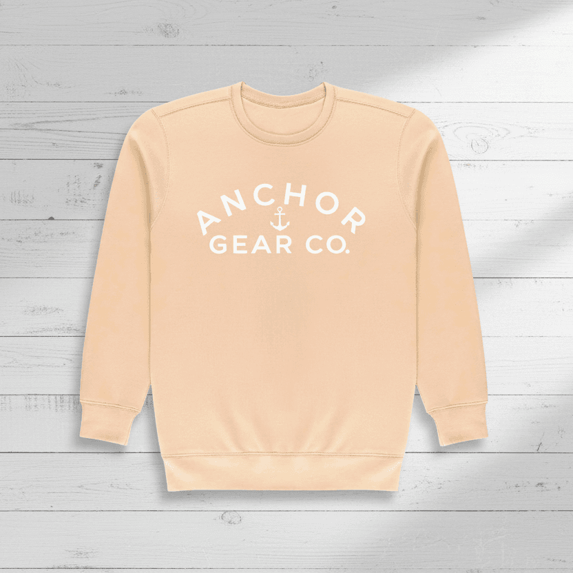 Beige sweatshirt with 'Anchor Gear Co.' text on a white background