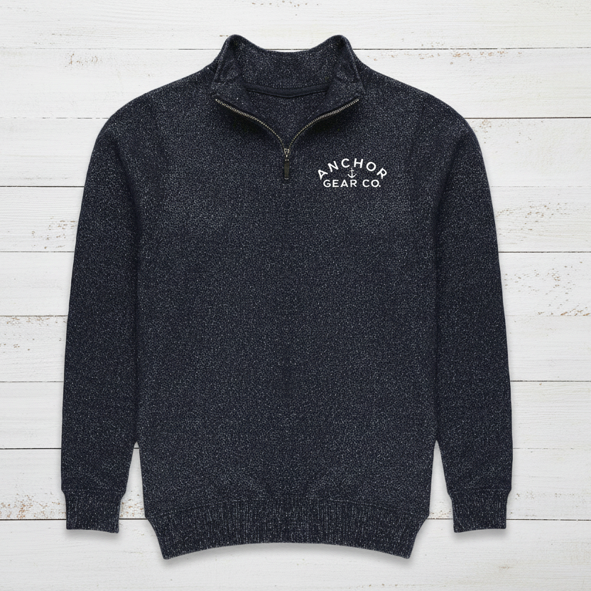 Dark gray sweater with 'Anchor Gear Co' logo on a white background
