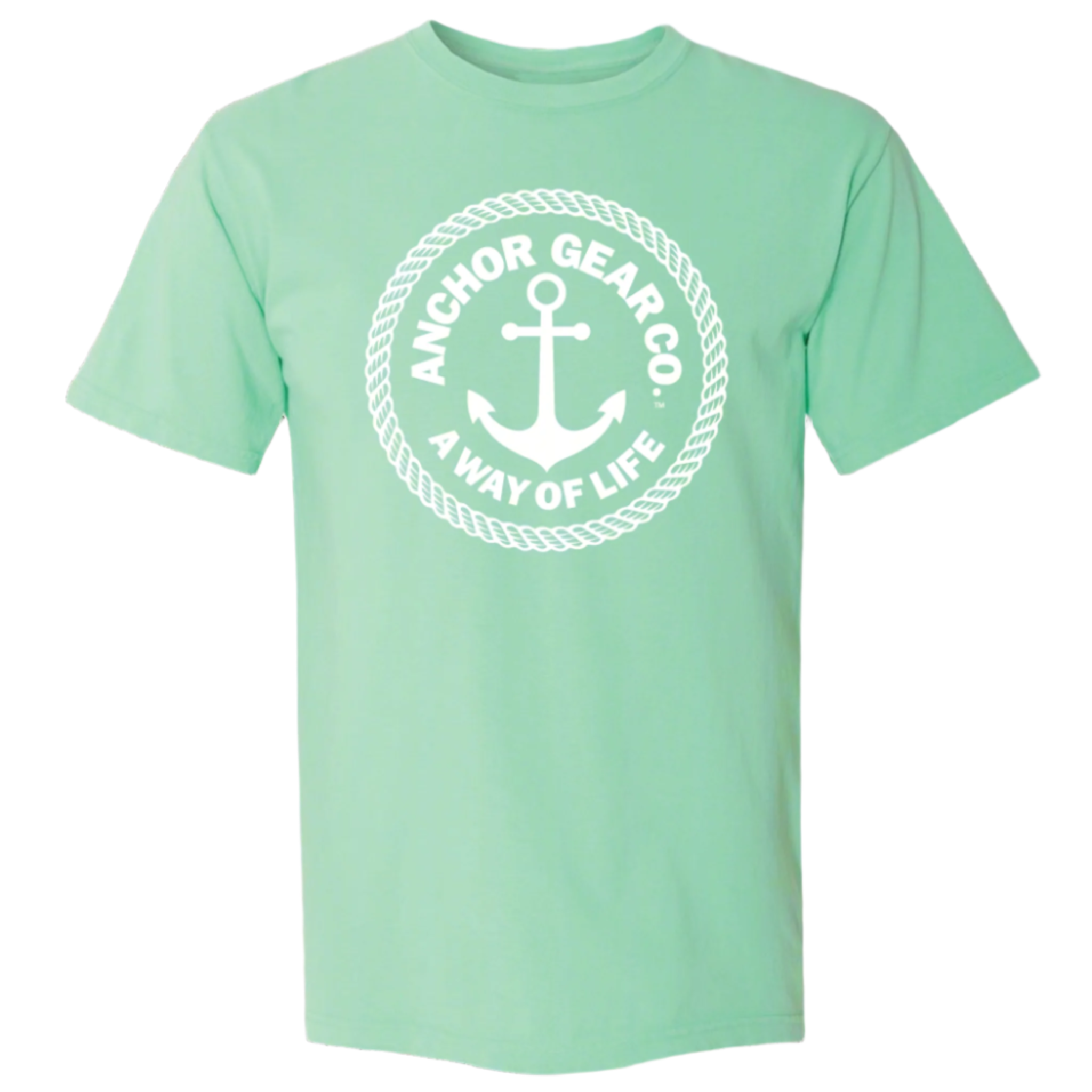 A green crew neck t-shirt with the Anchor Gear Co. logo printed in the center, displayed on a wooden jetty with trees and water in the background.