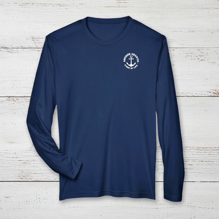A navy long sleeve performance shirt with a anchor design on the chest, displayed on white background.