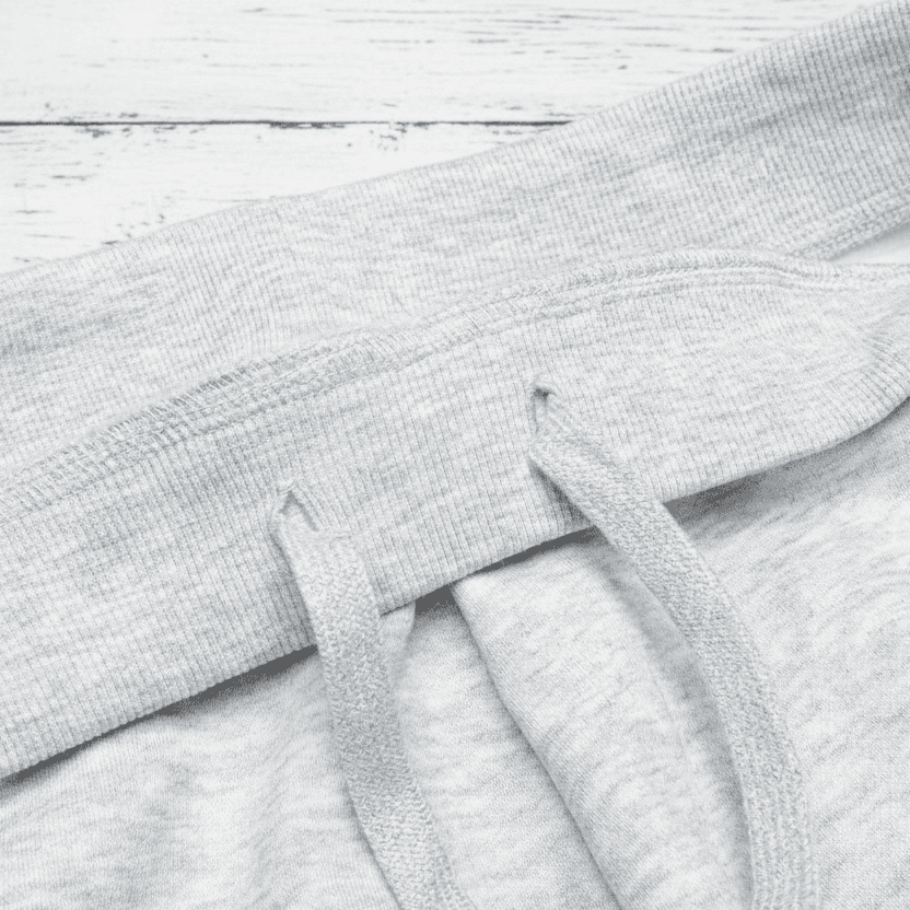 Close-up of gray fabric with stitching details