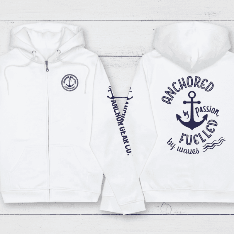 A navy blue full zip hoodie with a hood, featuring anchor symbols and text that reads 'Anchored by Passion, Fuelled by Waves' on the back.