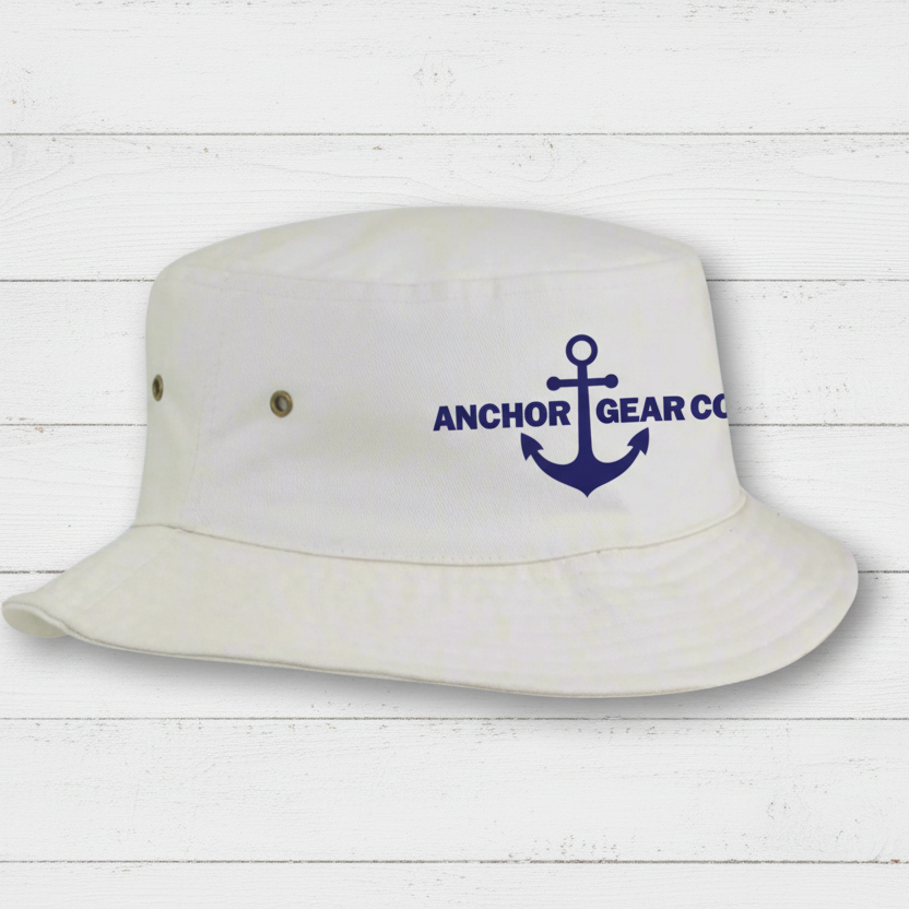 White bucket hat with 'Anchor Gear Co' logo.
