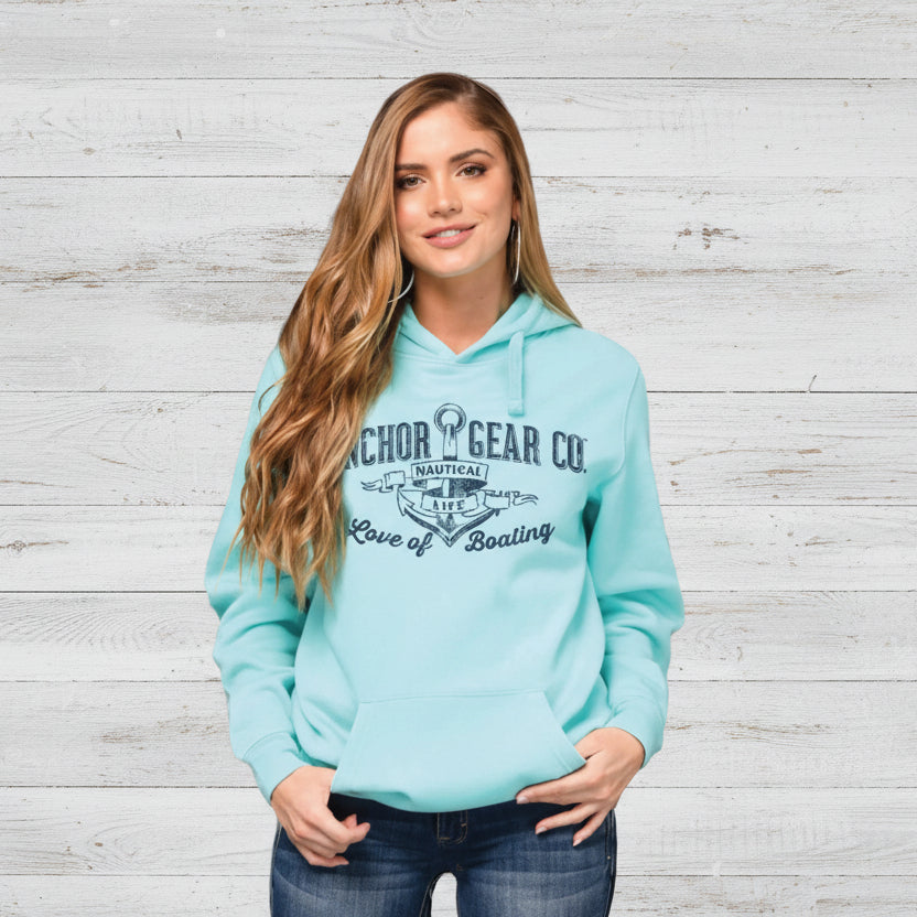 Woman wearing a light blue hoodie with text, with white background